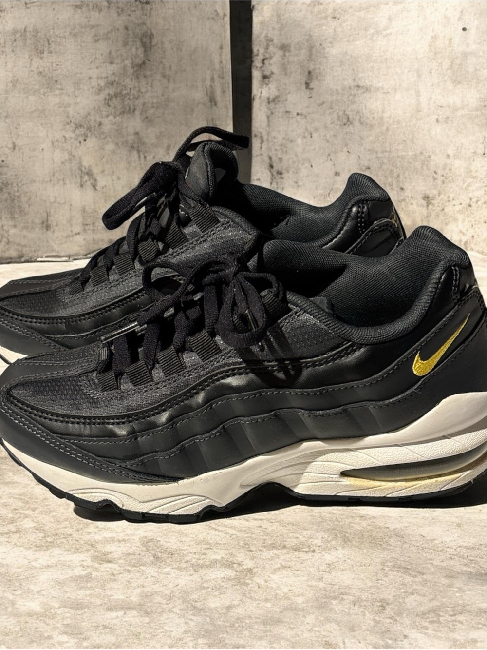 Nike Air Max Black and Gold Athletic Sneakers